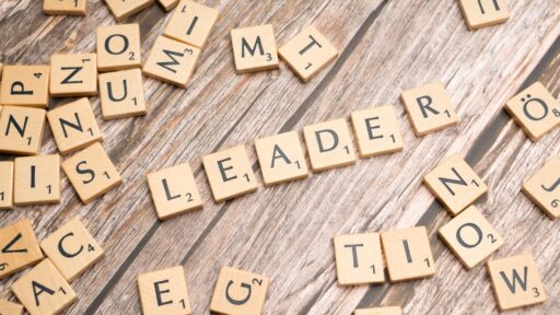 Manager providing constructive feedback to an employee in an office setting