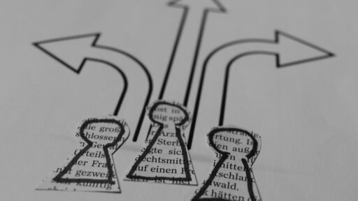 Diverse group of colleagues collaborating and smiling during a team building activity.