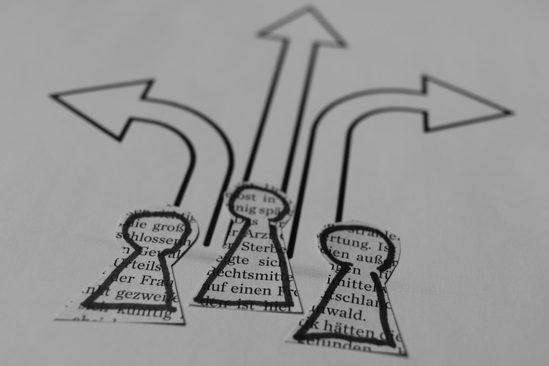 Diverse group of colleagues collaborating and smiling during a team building activity.